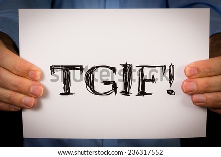 Studio shot of man holding white sign with the word TGIF Royalty-Free Stock Photo #236317552