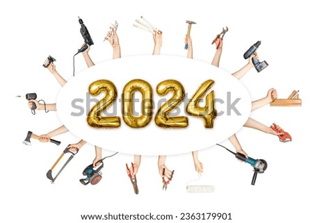 Hands holding multiple tools surrounding 2024 new year number made from golden balloons, hardware store holiday sign  