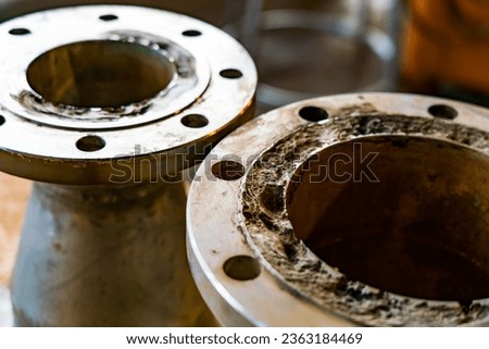 In the case of corrosion around the flanges of petroleum industry pipes. Royalty-Free Stock Photo #2363184469