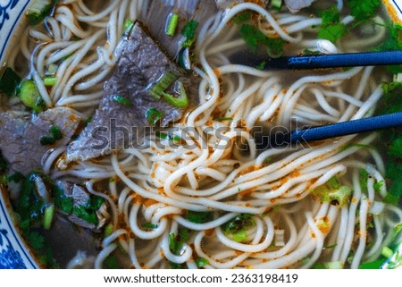 Chinese noodle soup. Asian style ramen noodles with beef and broth. Chinese Asian cuisine