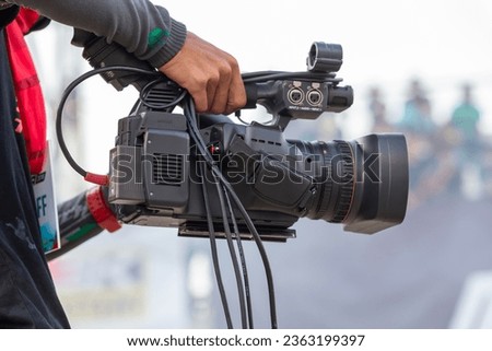 Close up Professional videographer on event, videographer filmmaker cinematographer camera, Filmmaking, videography.