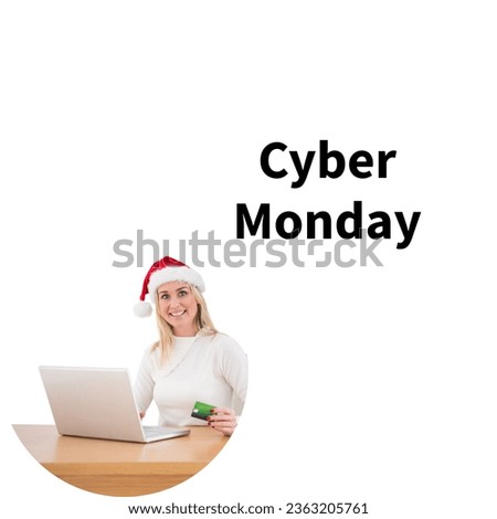Cyber monday text with happy caucasian woman in christmas hat using laptop and credit card online. Cyber monday, online shopping and sale promotion concept digitally generated image.