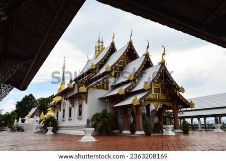 Church, Lanna Architecture at Wat Phra That Pu Chae, ymbols of Buddhism, South East Asia at Phrae Northern Thailand Royalty-Free Stock Photo #2363208169