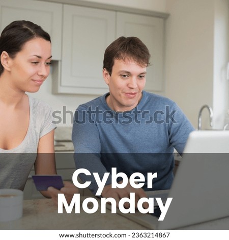 Cyber monday text over happy caucasian couple in kitchen using laptop and credit card online. Cyber monday, online shopping and sale promotion concept digitally generated image.