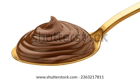 Hazelnut cream in spoon isolated on white background, full depth of field