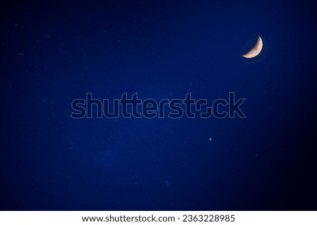 There are moon and stars in the blue sky. Slow exposure photography. Clear night sky in summer, New Taipei City, Taiwan Royalty-Free Stock Photo #2363228985
