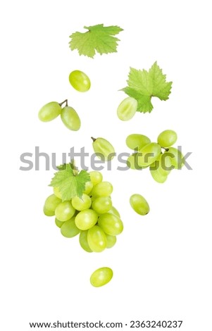 Green grape falling isolated on white background. Royalty-Free Stock Photo #2363240237
