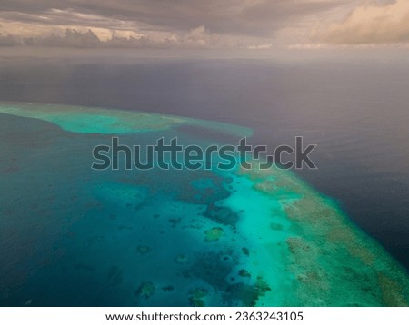 Aerial view of islands with white beach and blue ocean, baa atoll, maldives