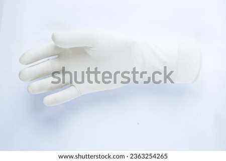 Doctor wearing medical surgical gloves
