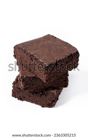 Chocolate brownie portions isolated on white background Royalty-Free Stock Photo #2363305215