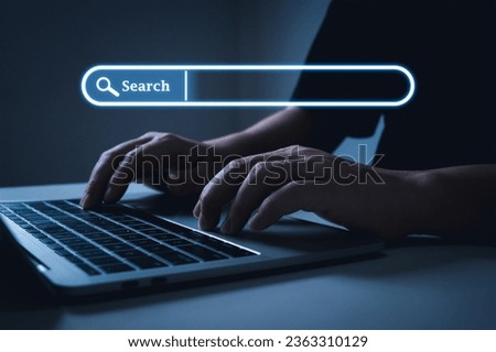 Search engine optimization. business people hand searching data on laptop computer with virtual screen search button, business finance, job interview, network technology, data search engine concept