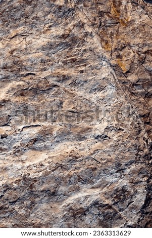 Cracked rock Texture. Stone surface with brown tint. Nature background