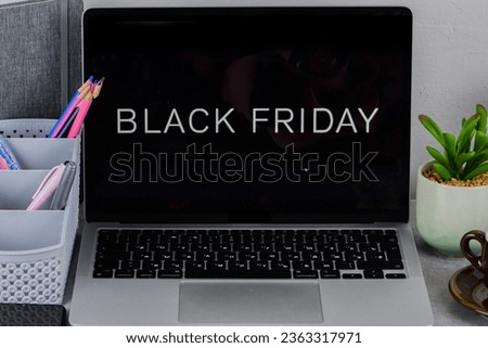 Laptop, money and credit card for purchases on the table. Black Friday Sale Online