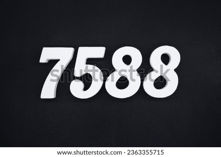 Black for the background. The number 7588 is made of white painted wood.