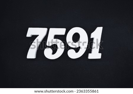Black for the background. The number 7591 is made of white painted wood.