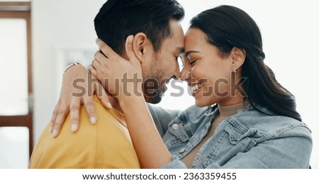 Couple, forehead touch and hug in living room with love, bonding and happy people together at home. Healthy relationship, trust and support in commitment, partner and dancing, romance and intimacy Royalty-Free Stock Photo #2363359455