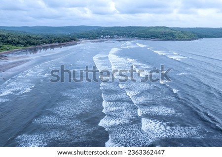 Aerial footage of Ladghar beach at Dapoli, located 200 kms from Pune on the West Coast of Maharashtra India. Royalty-Free Stock Photo #2363362447