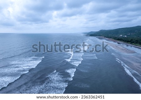 Aerial footage of Ladghar beach at Dapoli, located 200 kms from Pune on the West Coast of Maharashtra India. Royalty-Free Stock Photo #2363362451