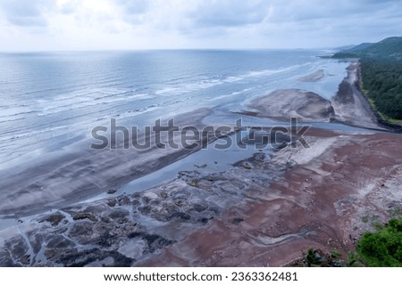 Aerial footage of Ladghar beach at Dapoli, located 200 kms from Pune on the West Coast of Maharashtra India. Royalty-Free Stock Photo #2363362481