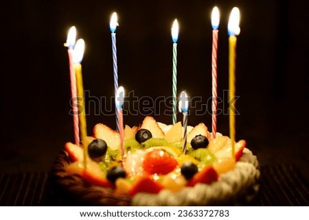 Delicious and cute cake with candles