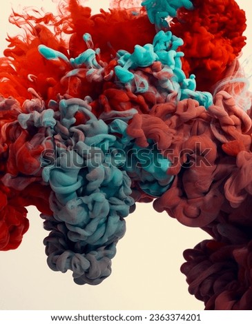 Abstract background of red and blue paint in water isolated