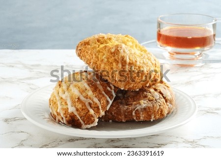 pile of fruit scones on a plate