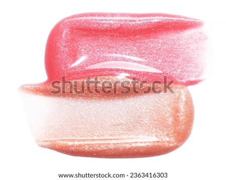 Pink gold lip gloss texture composition isolated on white background. Cosmetic product smear smudge swatch Royalty-Free Stock Photo #2363416303