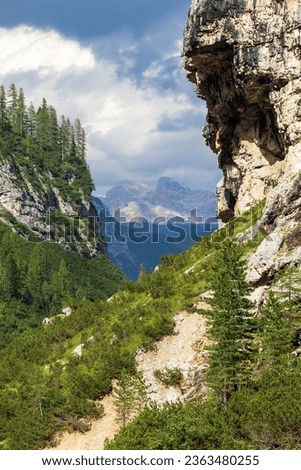 Valley Val Travenanzes and rock face in Tofane gruppe, Alps Dolomites mountains, Fanes national park, Italy Royalty-Free Stock Photo #2363480255