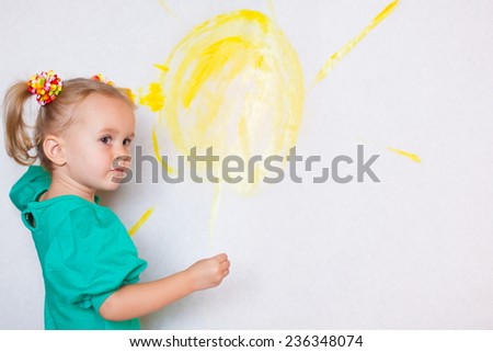 beautiful  smiling  little blonde girl  with brush  paints fresh trendy summer spring joy happy look cute studio impressions lady