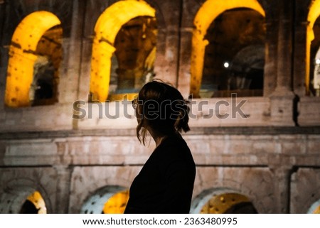 night picture in front of the colloseum in rome