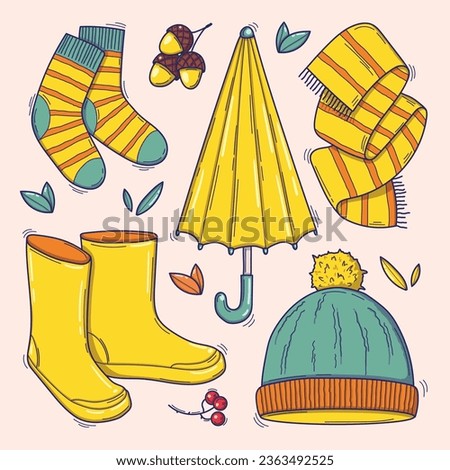 Set of cozy autumn elements clipart. Vector colorful illustration of warm clothes in doodle style isolated on light background