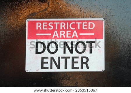 sign with large TEXT DO NOT ENTER in a protected area that is not accessible