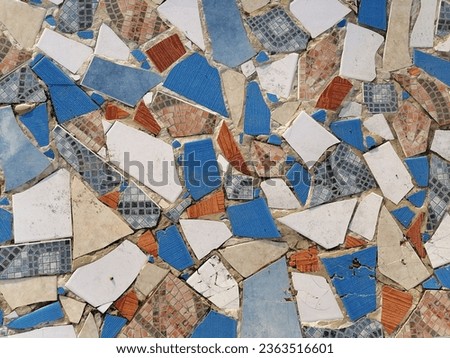 Mosaic of old cracked tiles.
