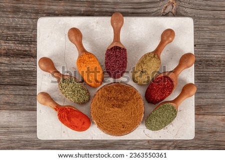 Seven types of spice mixture is an aromatic spice that is indispensable in Turkish cuisine. A mixture of dried red peppers and other spices. Royalty-Free Stock Photo #2363550361