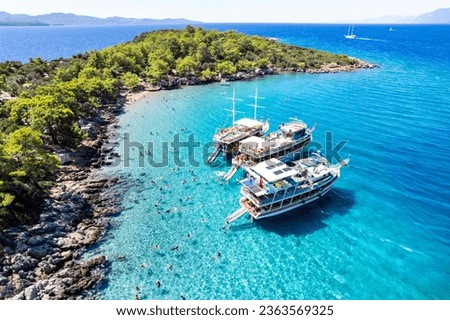 Marmaris, Mugla, Turkey. Incekum Beach in Marmaris with perfect turquoise water. Aerial view of beach, drone shot. Royalty-Free Stock Photo #2363569325