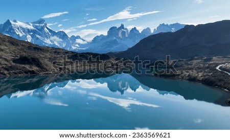 Scenic Lake Of Torres Del Paine In Punta Arenas Chile. Snowy Mountains. Glacier Landscape. Punta Arenas Chile. Winter Background. Scenic Lake At Torres Del Paine In Punta Arenas Chile. Royalty-Free Stock Photo #2363569621
