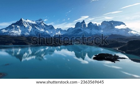 National Park Of Torres Del Paine In Puerto Natales Chile. Snowy Mountains. Glacier Landscape. Puerto Natales Chile. Winter Background. National Park At Torres Del Paine In Puerto Natales Chile.