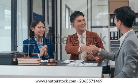 handshake of Legal consultation, asian lawyers team meeting post-contract, contract finalization, lawyers discussing agreements, agreement assessment, legal experts in conversation