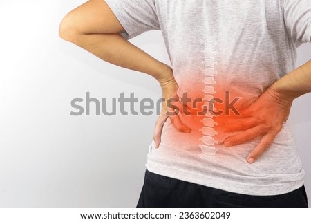 Woman suffering from waist, backache or hip pain on white background. Backache, office syndrome and health concept. Royalty-Free Stock Photo #2363602049