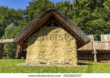 Abstract photo of an ancient hut. Ancient mud house. Exhibition of period housing.