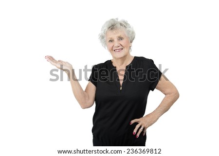 Old woman doing a gesture with her hand against a white background