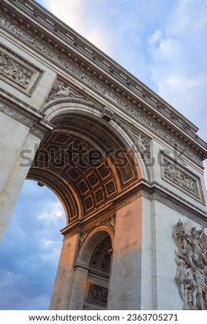 Sunset in the Arc de Triomphe in Paris Royalty-Free Stock Photo #2363705271