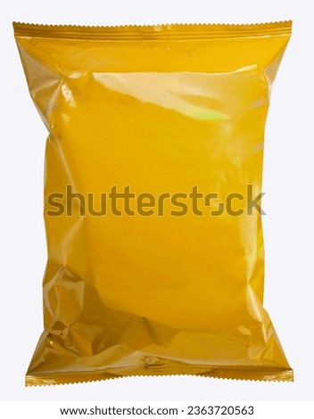 Food Packaging, Foil and plastic snack bags mockup isolated on white background, Yellow colored pillow packages for food production on White Background With clipping path. Royalty-Free Stock Photo #2363720563