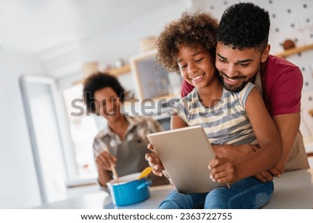 African family tablet and child learning at home with happiness, development, internet connection.