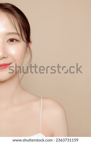 Close up Young Asian beauty woman pulled back hair with korean makeup style on face and perfect skin on isolated beige background. Facial treatment, Cosmetology, plastic surgery.