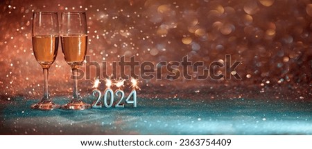 2024 New Year. Happy new year 2024 greeting card. champagne glasses on glitter background