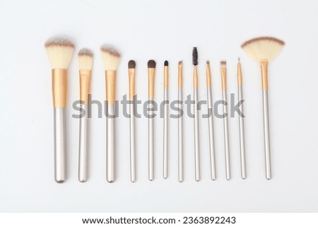 Makeup brushes
Cosmetic applicators
Beauty tools
Brush set
Makeup artist essentials
Precision application
Cosmetic bristles
Foundation blending
Eye shadow brushes
Professional makeup brushes Royalty-Free Stock Photo #2363892243