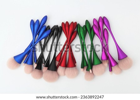 Makeup brushes
Cosmetic applicators
Beauty tools
Brush set
Makeup artist essentials
Precision application
Cosmetic bristles
Foundation blending
Eye shadow brushes
Professional makeup brushes Royalty-Free Stock Photo #2363892247