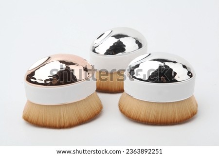 Makeup brushes
Cosmetic applicators
Beauty tools
Brush set
Makeup artist essentials
Precision application
Cosmetic bristles
Foundation blending
Eye shadow brushes
Professional makeup brushes Royalty-Free Stock Photo #2363892251