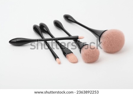 Makeup brushes
Cosmetic applicators
Beauty tools
Brush set
Makeup artist essentials
Precision application
Cosmetic bristles
Foundation blending
Eye shadow brushes
Professional makeup brushes Royalty-Free Stock Photo #2363892253